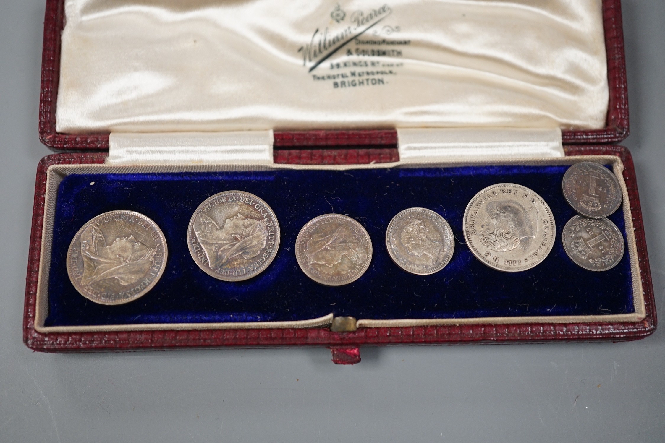 An 1897 cased maundy set and two other coins